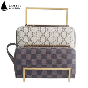 منصات عرض متدرجة راقية لمراكز التسوق ومتاجر الملابس، حامل عرض محافظ من الفولاذ المقاوم للصدأ - Product Image 4