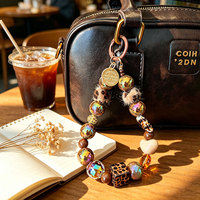 Porte-clés tendance INS pour filles, pendentif perlé léopard noir, style doux et épicé