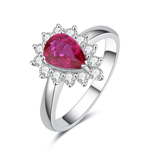 Anillo de Lujo Personalizado de Oro Sólido de 18K con Rubí de 1 Quilate en Corte Pera, Acabado Clásico en Rodio, Regalo Perfecto para Bodas, Aniversarios y Fiestas - Product Image 1