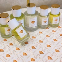 Autocollants de parfum personnalisés imperméables sur papier couché - Service d'échantillonnage rapide avec confirmation de la conception