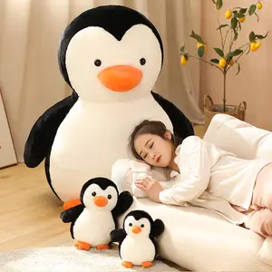 Mignon petit pingouin en peluche poupée griffe machine jouets oreiller de couchage cadeau d'anniversaire pour enfants grande vente en gros