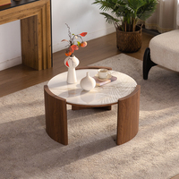 Table basse ronde en ardoise de style italien moderne et minimaliste, luxe léger, avec structure en bois massif, design élégant pour salons