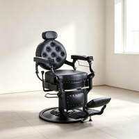 Chaise de coiffure noire gothique, cuir capitonné rond, accoudoirs en métal mat et base circulaire sur pied.