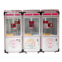 Machine à attraper de l'argent Neofuns, machine d'arcade de divertissement, machine à pièces à fort rendement, cube à pièces, jeu de capture d'argent pour les entreprises