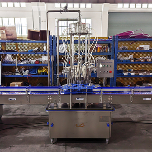 <span class=keywords><strong>Macchina</strong></span> riempitrice rotante a pressione negativa automatica in acciaio inossidabile riempitrice di riempimento di succo di Vodka Whisky riempitrice di liquidi - Product Image 4