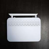 Modem Router GPON ZIKUN ZC-521X6T FTTH dengan 4 Port LAN GE, 1 Port POTS, 1 Port CATV, dan WiFi 6 Dual-Band AX3000