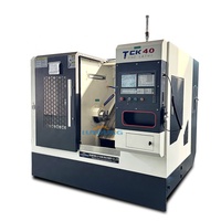 Tour CNC à lit incliné Tck40, petit tour CNC avec mandrin hydraulique, machine de fraisage CNC pour le métal