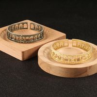 Bracelet bouddhiste zen en laiton, manchette ouverte, motif Bouddha de la Niche du Temple de la Caverne, motif Mille Bouddhas ajouré, effet vieilli vintage