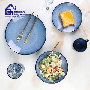 <span class=keywords><strong>Service</strong></span> de table <span class=keywords><strong>en</strong></span> grès de Chine 16 pièces, assiettes, bols et tasses, noir et bleu, rond, <span class=keywords><strong>en</strong></span> <span class=keywords><strong>porcelaine</strong></span>, pour 4 personnes - Product Image 1