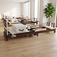 Machine de Pilates Reformer Pliante de Luxe en Noyer, Qualité Studio Professionnelle, Lit Pliable en Bois Foncé