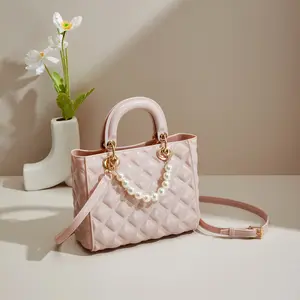 Toptan lüks tasarımcı çanta ünlü kadınlar için en kaliteli patent deri çanta 2024