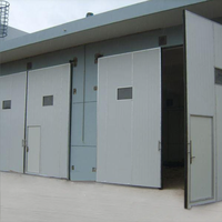 Porte industrielle à ouverture latérale en acier galvanisé épais sur mesure, isolation thermique PU, coupe-vent