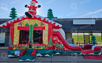 Château gonflable commercial de Noël avec toboggan, thème Père Noël, pour location événementielle