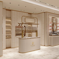 Kiosque de présentation de parfums modulaire personnalisé, bar à parfums mobile avec vitrine en verre éclairée par LED pour les magasins de vente de parfums