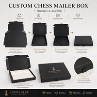 Boîte d'expédition en carton ondulé noir personnalisée pour l'emballage d'un jeu d'échecs avec insert en mousse, finition mate, impression de logo doré pour les coffrets cadeaux