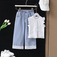 Nouvel ensemble deux pièces pour filles, printemps et été, décontracté, haut uni avec nœud + jean respirant en polyester/coton avec couture en dentelle