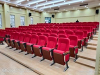 Vente en gros Chaises pour auditorium avec table rotative Bloc-notes Siège de théâtre Fournisseur
