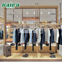 Mobilier de magasin de vêtements pour hommes moderne personnalisé vitrine de magasin de vêtements conception d'affichage de vêtements au détail pour homme magasin de costumes
