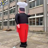 Cuisinier gonflable personnalisé de haute qualité agitant le chef de ballon gonflable à la main