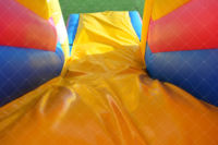 Château gonflable commercial haut de gamme en PVC robuste avec toboggan combiné, trampoline à bungee et structure gonflable de type « Candy Park »