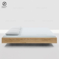 Lit tatami bas sans tête de lit en noyer noir de style nordique japonais, sur mesure pour chauffage au sol et gîtes