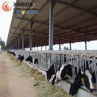 Structure en acier préfabriquée économique pour la construction de bâtiments agricoles modernes, de hangars à bétail et de granges