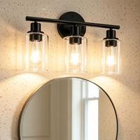 Applique murale en fer noir à 3 têtes pour salle de bain avec abat-jour en verre transparent – Prix de gros