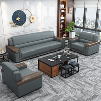 Canapé de bureau moderne et simple, ensemble combiné de table basse et trois fauteuils en cuir chinois pour réception professionnelle