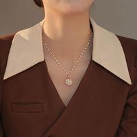Collier tendance en acier inoxydable avec pendentif trèfle à quatre feuilles rotatif en pierre blanche, chaîne à maillons, pour femme, style brise froide, en cuivre de haute qualité