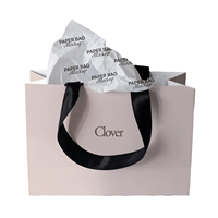 Poignée de sac en papier rose de luxe Conception personnalisée pour ensemble de cadeau de luxe avec stratification de logo personnalisé pour sac à provisions de supermarché