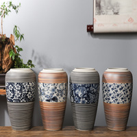 Vase moderne minimaliste en porcelaine bleue et blanche sculpté à la main pour la décoration de la maison et la culture hydroponique