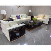Ensemble de canapés en cuir véritable Furnistyle, style moderne, pour hôtels et villas, avec structure en acier inoxydable rose doré, design lounge, rembourrage en éponge