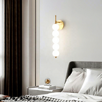 Lampe murale moderne nordique en fer avec bande LED et lumière chaude pour la décoration de la chambre à coucher et du salon