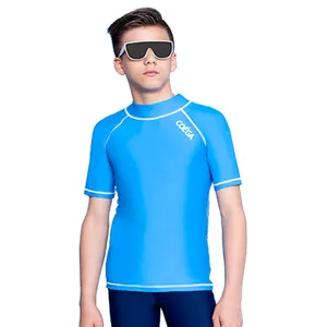 Boys Youth RG SS Blue 80% Polyamide and 20% Lycraa QUICK DRY stnd Solid Rashguard COEGA Sunwear for Kids