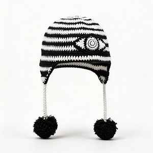 Bonnet à oreilles en crochet noir et blanc, bonnet tricoté fait main avec pompons et motif œil porte-bonheur, bonnet chaud d'hiver pour le ski et le streetwear - Product Image 5