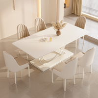 Table de salle à manger de mariage blanche extensible rectangulaire de luxe avec plateau en pierre frittée et base sculpturale moderne pour hôtel et salle de banquet – Vente en gros