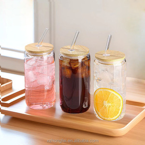 Vente en gros de verres à shot en <span class=keywords><strong>verre</strong></span> borosilicate de haute qualité de 16 oz et 20 oz avec couvercle en bambou et paille, écologiques, pour les fêtes, le café, le jus, la bière, l'<span class=keywords><strong>eau</strong></span> - Product Image 1