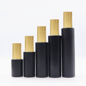 20ml 30ml 50ml 60ml 80ml 100mL 120ml Botella de vidrio de loción negra personalizada vacía con tapa de bomba de suero Juego de cosméticos 30g 50g Botes de crema - Product Image 2