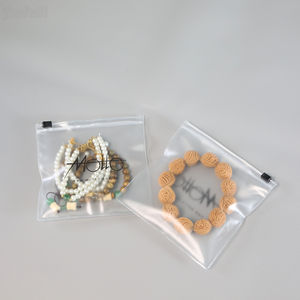 Bolsa de embalaje Ziplock de plástico mate esmerilado personalizado de Pvc con logotipo de lámina dorada para almacenamiento de accesorios de joyería bolsa de cremallera de Metal - Product Image 1