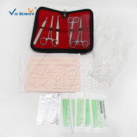 Kit de formation en suture chirurgicale avec coussinet en silicone PVC et 7 instruments pour ressources pédagogiques en laboratoire d'infirmierie CE ISO ROHS CNAS