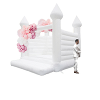 Château gonflable commercial blanc en PVC avec souffleur d'air pour mariages et événements