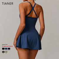 Robe de tennis personnalisée OEM pour femme avec short intégré, coussinets de soutien-gorge amovibles, décolleté en V profond et dos croisé, tenue de sport/yoga