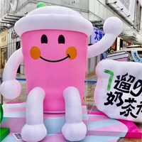 Grande mascotte gonflable personnalisée avec logo couleur en forme de bouteille ou de tasse à café pour campagne marketing d'ouverture de boutique