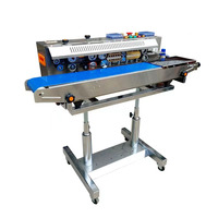 Machine de scellage thermique verticale semi-automatique à bande continue pour sachets et emballages de boissons