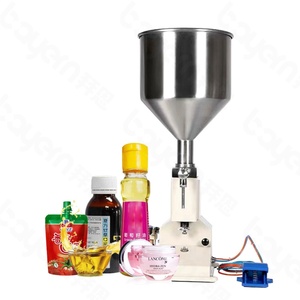 Machine de remplissage verticale manuelle pneumatique pour bouteilles de 10 à 100 ml, idéale pour le shampoing, le beurre de cacahuète, le miel, les sauces, le yaourt, les crèmes cosmétiques et les liquides. - Product Image 1