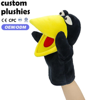 Marionnette à main en peluche noire douce en forme d'oiseau avec yeux de dessin animé, idéale pour les activités d'éveil - Prix direct usine