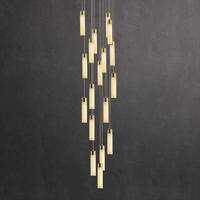 Lustre cylindrique moderne en albâtre, suspension en fer à cascade de pluie multi-lumières pour escalier, plafond haut, hôtel, villa