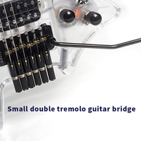 Usine OEM/ODM Corps acrylique de haute qualité Guitare électrique sans tête à 6 cordes-Modèle portable et pratique pour les débutants