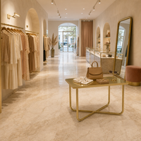 Comptoir de présentation en métal doré avec base en X pour magasin de vêtements, fourniture d'usine OEM ODM