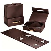 Boîte cadeau rigide pliable ODM avec poignée portable, logo personnalisé en relief pour souvenir d'entreprise, emballage cadeau de luxe